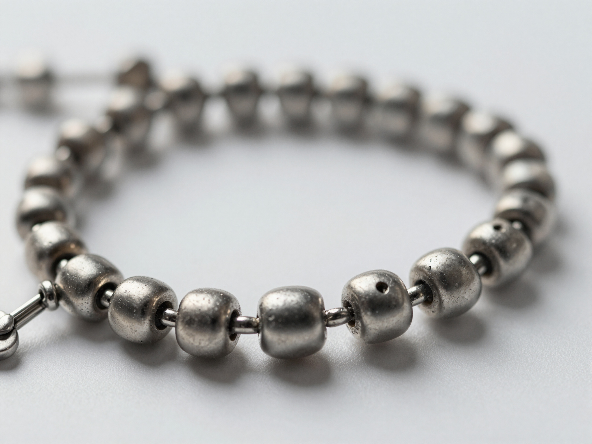 Close-up of the metal beads shown on the existing XINZE website